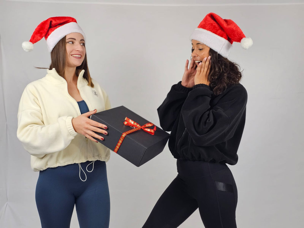 offrir un cadeaux de noël à une femme sportive Image