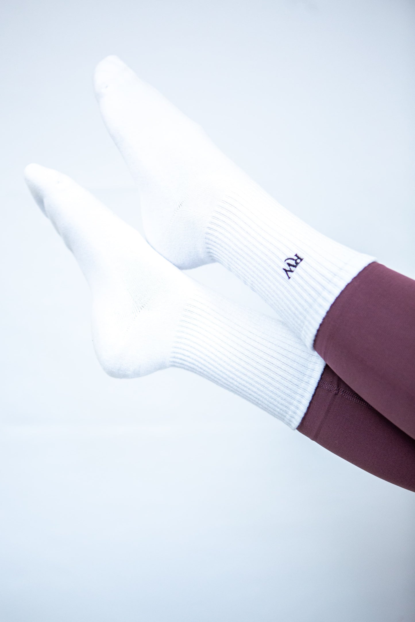 pied en l'air avec chaussette reveal wear